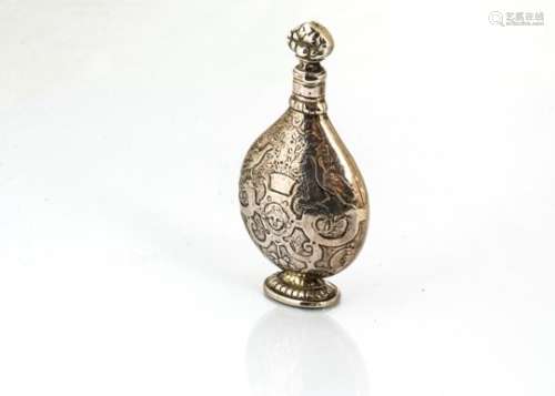 A Victorian silver scent bottle, ovoid on oval foot and with stopper, import marked for London 1886