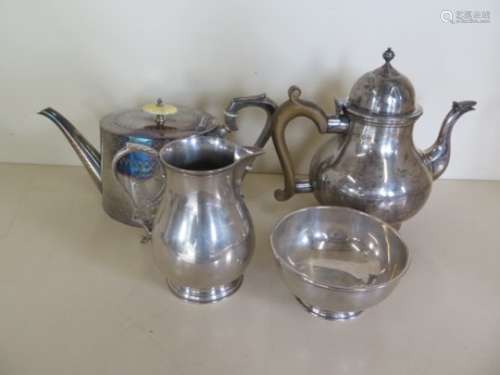 A silver teapot, London 1921 - Mappin and Webb, with matching milk jug, a silver sugar bowl,