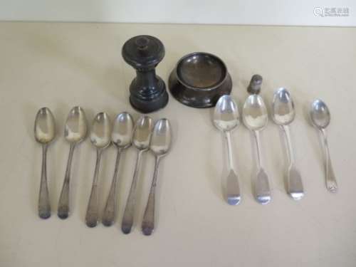 Ten silver teaspoons, a silver grinder and a weighted silver dish and thimble, weighable silver