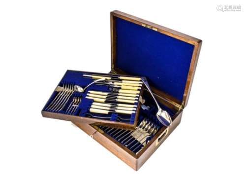 An Art Deco canteen of cutlery from William Hutton & Sons, in oak box