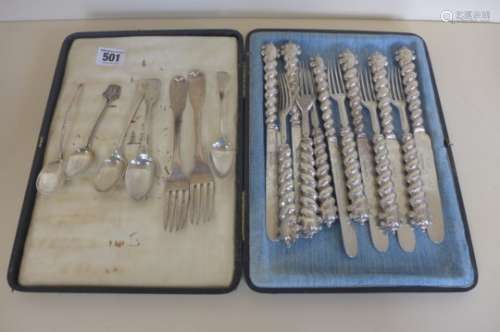 A set of six silver bladed and silver filled handled desert knives and forks, Sheffield 1885 -
