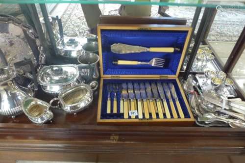 A good collection of silver plate to include four piece tea set, trays, tankards, cutlery etc