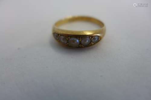 An 18ct gold and pearl Victorian/Edwardian ring, size K 1/2 weight approx 2.9 grams, some wear to