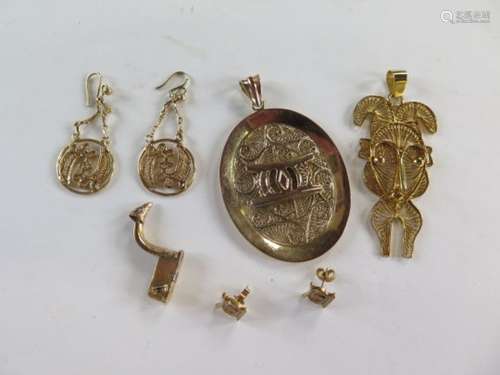 A collection of Ghanaian gold jewellery including pendants, earrings etc - not hallmarked but tested