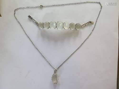 A white metal moonstone bracelet and pendant on chain, pendant stone measures approx 25x14x8.5mm -