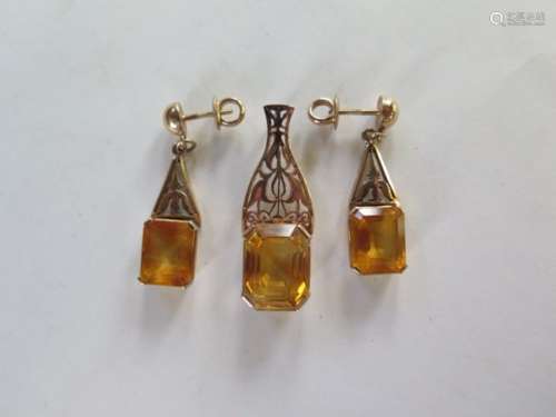 A 14ct yellow gold citrine pendant earring set, pendant stone approx 15x12x9mm, pendant length 35mm,