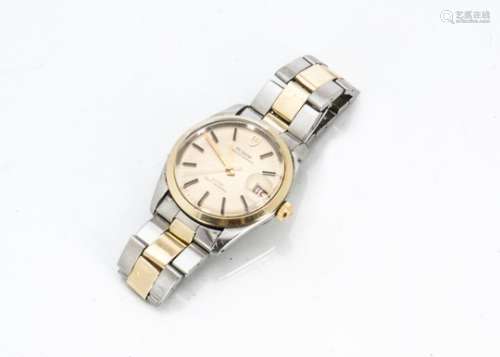 A c1980s Tudor Prince Oysterdate Rotor Self Winding stainless steel and gilt gentleman's wristwatch,