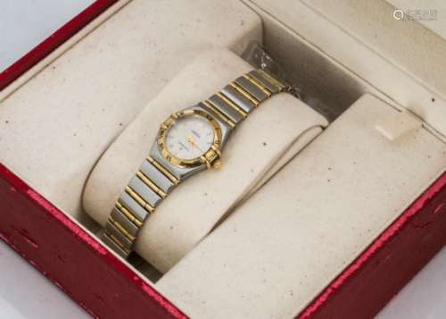 A 1990s Omega Constellation lady's stainless steel and gilt wristwatch, 24mm case with gilt bezel