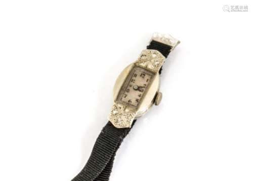 An Art Deco period 18ct gold and diamond cocktail dress watch, oval case with shaped lugs each set