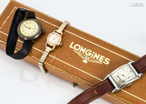 A 1960s Longines 9ct gold cased lady's wristwatch, on later expanding strap in a Longines long