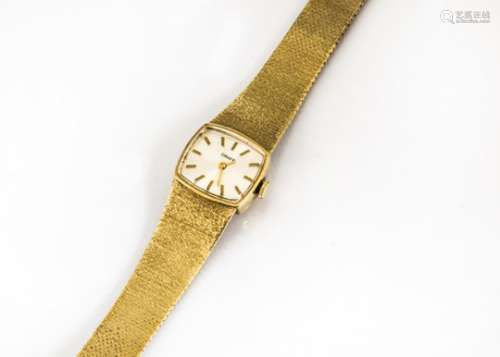 A c1960s Oraff 9ct gold lady's wristwatch, oblong case and dial on an integrated 9ct gold strap, 30g