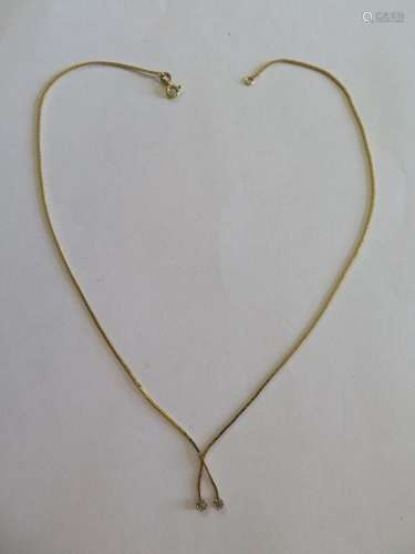 A 9ct yellow gold and diamond necklace, the fancy box link chain measures 40cm with two small