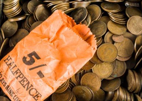 A large collection of pennies and half pennies, over 30 kgs, in a biscuit tin and a box (parcel)