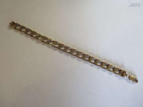 A mens heavy 9ct gold curb link bracelet, fully hallmarked, length 22.5cm, weight approx 34.6 grams,