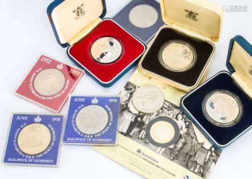 A collection of British crowns, including a silver proof 1977 crown, 80th Queen Mother crown and a