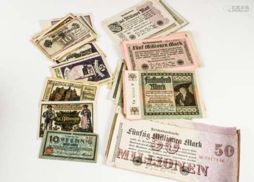 A large collection of German bank notes and paper tokens
