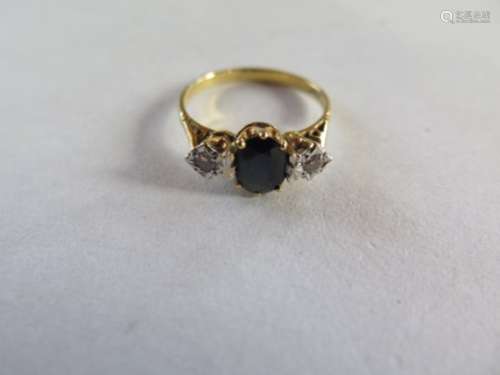 An 18ct yellow gold diamond and sapphire ring, size N, approx 2.9 grams, generally good