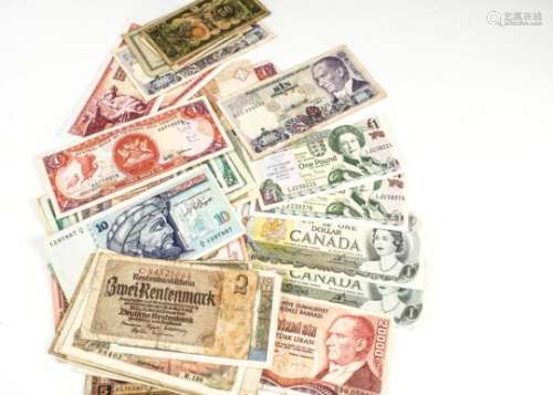 A collection of World bank notes, including two Jersey £1, two Canada $1, along with examples from