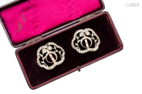 A pair of Victorian paste set buckles, the floral and crescent moon design within an ogee frame, set