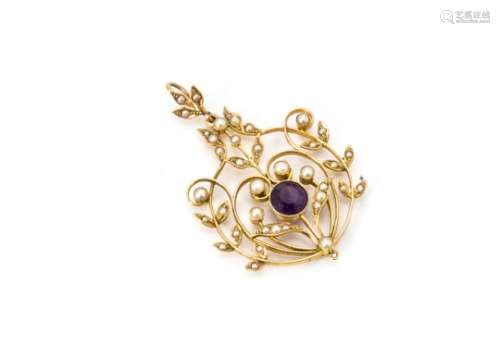 An Edwardian amethyst and seed pearl yellow metal set art nouveau pendant, of oval, floral design,