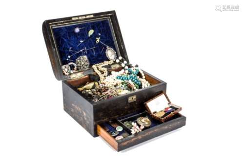 A large collection of costume jewellery, including beads, brooches, pins in a coromandel box (af)