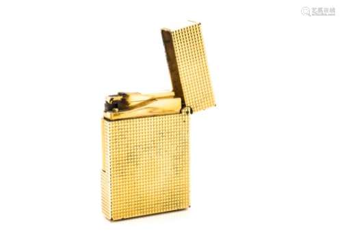A gilt metal Dupont pocket lighter, with textured geometric pattern, stamped and numbered to base