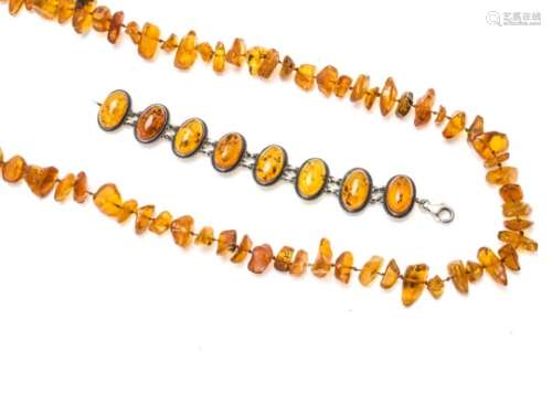 A Baltic amber rough bead, knotted strung necklace, with 14ct gold clasp, 51g together with an amber
