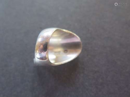 A Georg Jensen silver ring, no 140 - ring size M, approx 21 grams, marks consistent with use