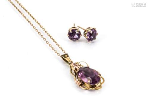 An amethyst and yellow metal drop pendant on chain, and two amethyst stud earrings