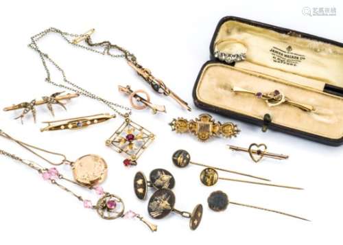 A quantity of gold brooches, one cased, including a 15ct gold sapphire and seed pearl bar brooch