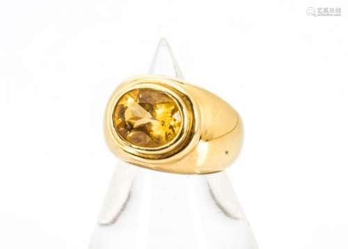 A French high carat gold citrine dress ring, the oval mixed cut in stepped rubbed over setting on