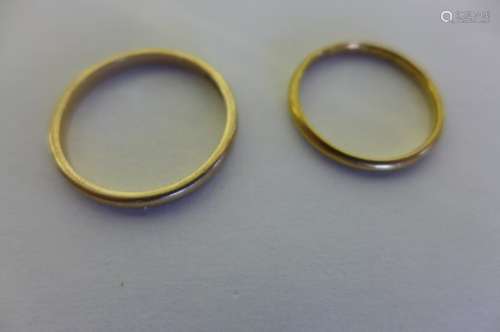 An 18ct yellow gold wedding band, weight approx 1.7 grams, size M, and a 9ct wedding band, weight