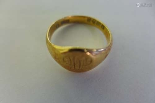 An 18ct gold signet ring, weight approx 5 grams, size N - some wear, with monogram