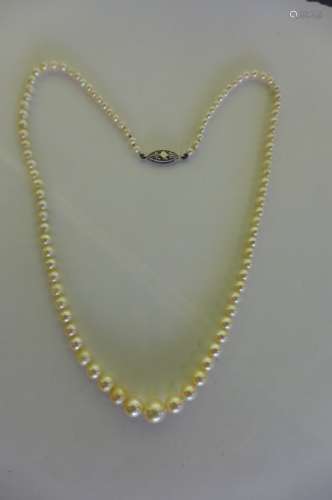 A fine quality three string pearl necklace, with 9ct garnet and pearl clasp, string length 40cm,