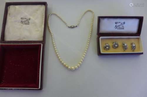 A single string of pearls with 9ct white gold clasp and two pairs of silver, marcasite and pearl