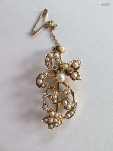 A 15ct yellow gold pearl and diamond brooch, 4cm wide, approx 6.6 grams, in generally good condition