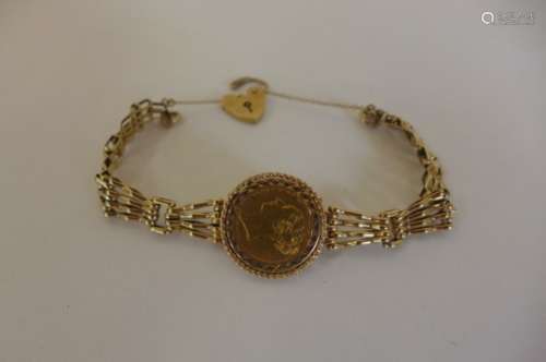 A Victorian shield back gold full sovereign dated 1864 - in a 9ct bracelet, total weight approx 16.9