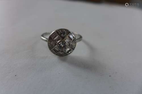 A platinum and diamond cluster ring, size L, approx 2.7 grams, diamonds bright, some usage