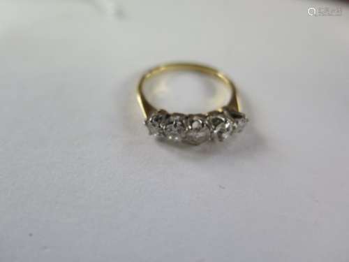 An 18ct yellow gold five stone diamond ring, size J, approx 2 grams, diamonds bright, wear to