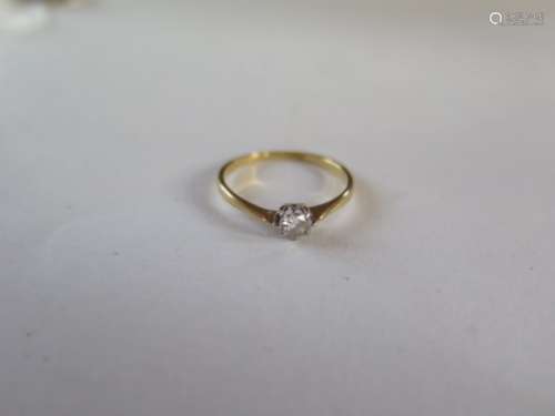 An 18ct gold and platinum solitaire diamond ring, size L, approx 0.20ct, approx 1.1 grams