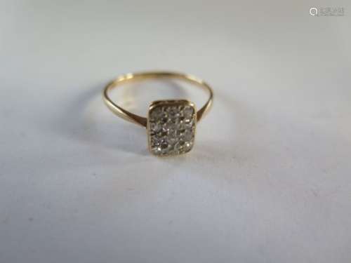 An 18ct gold twelve stone diamond ring, size P, approx 1.6 grams