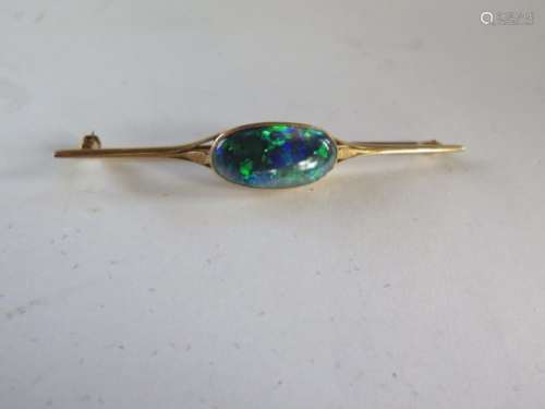 A 15ct yellow gold opal brooch 6cm long, approx 4 grams, generally good condition