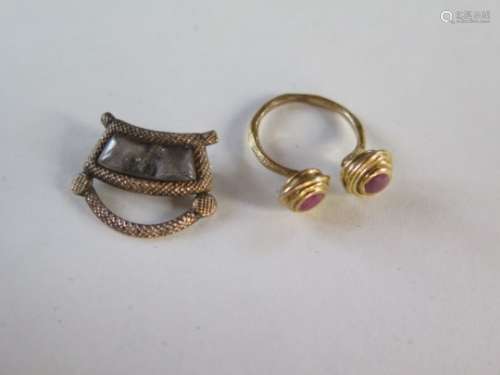 A gold mourning brooch, approx 2.6 grams, tests to approx 9ct, a Roman style ruby ring, tests to