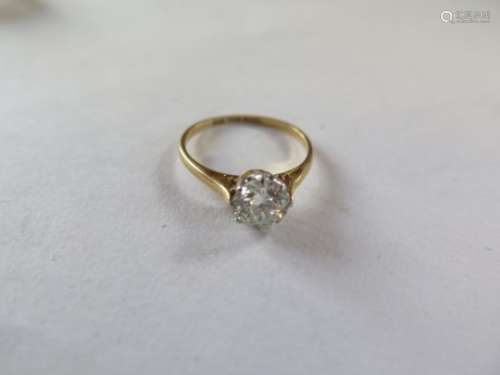 An 18ct gold solitaire diamond ring, size h/I, approx 0.68ct, 1.4 grams, in generally good