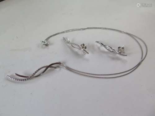 A 9ct white gold pendant necklace and matching earrings total weight approx 6.6 grams