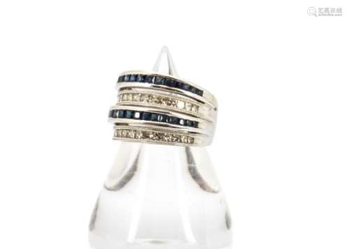 A 14ct gold diamond and sapphire multi row half hoop dress ring, blue square cut sapphires