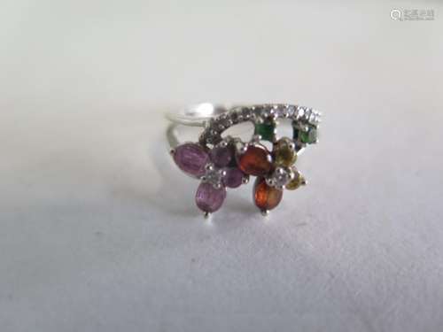 A multi gem and diamond, 18ct white gold ring, size K, approx 4 grams, generally good