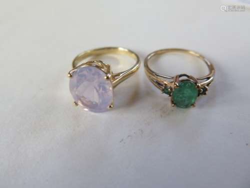 A 9ct emerald ring, with certificate, size O, and a 9ct kunzite ring, with certificate, size N, both