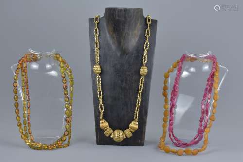 Five Necklaces including Two Amber Bead necklaces