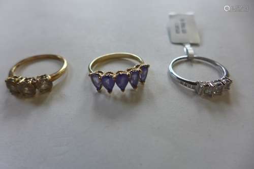 Three 9ct gold rings, diamond, csarite and tanzanite, sizes N/O, total weight approx 5.9 grams,